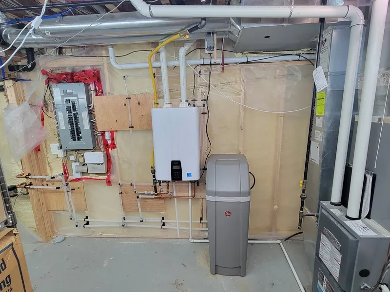 Tankless water heater being diagnosed in Guelph